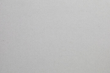 A white background with a grey texture, textured origami paper backdrop