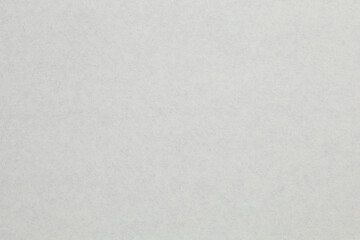 A white background with no visible objects, textured origami paper backdrop