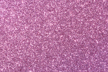 A pink background with glittery texture