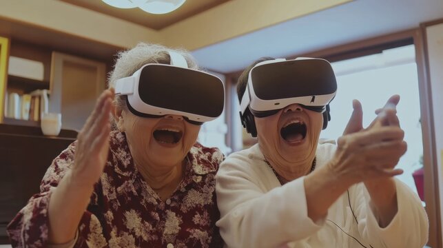 Elderly Asian couple playing a virtual reality (VR) game together, laughing and having fun, breaking stereotypes about technology and seniors - Powered by Adobe