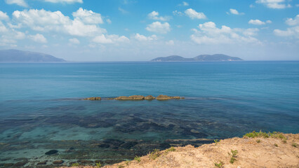 view over rocky Albania coast in the far distance.