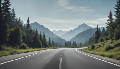 Naklejka premium Asphalt road winding through a scenic mountain valley, lush green forests, and hazy peaks under a tranquil sky