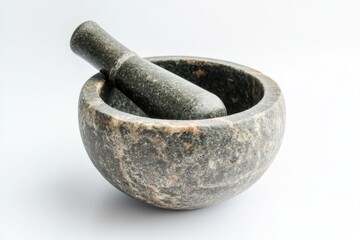 Mortar and pestle on clean white background showcasing kitchen supplies for culinary use