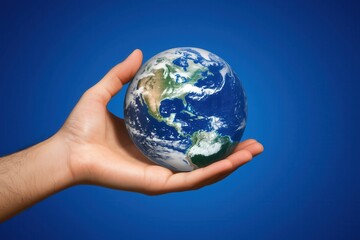 hand holding the earth