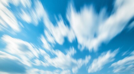 Dynamic abstract sky wallpaper with blurred clouds creating a sense of motion