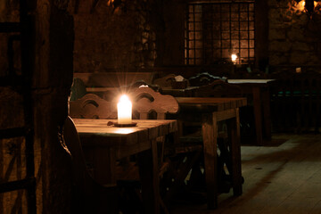 dungeon tavern fantasy bar dusk shade candle lighting cozy safe space without people role plating concept