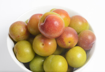 Plum fruits of Prunus genus, a genus of threes and shrubs in the flowering plant family Rosaceae. Dried plums are often called prunes.