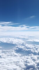 Stunning Aerial View of Fluffy White Cumulus Clouds Above a Deep Blue Sky