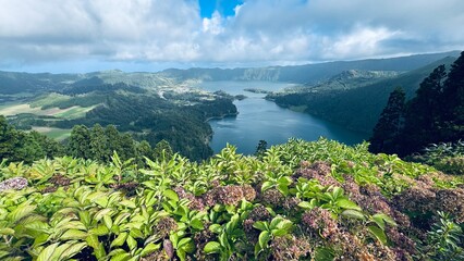 Sete Cidades in Lagoa on the island of São Miguel is a picturesque volcanic caldera with two connected lakes – Lagoa Azul and Lagoa Verde, which captivate with their contrasting water colors. Portugal