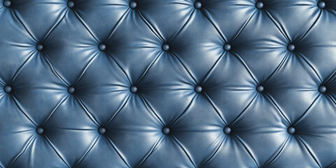 Fototapeta premium A quilted chambray blue abstract background with padded, tufted leather textures, creating a plush, elegant, and stylish visual effect.