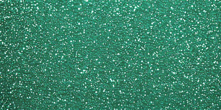 A bright emerald green glitter backdrop, with sparkling specks of light that shift in every direction. The rich color and shimmering effect make it ideal for holiday designs, luxurious branding, or