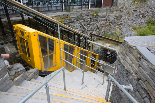 Wales, Gwynedd, Llechwedd - July 08, 2024: A narrow-gauge railway carries visitors on a section of the Deep Mine Tour since 1979.