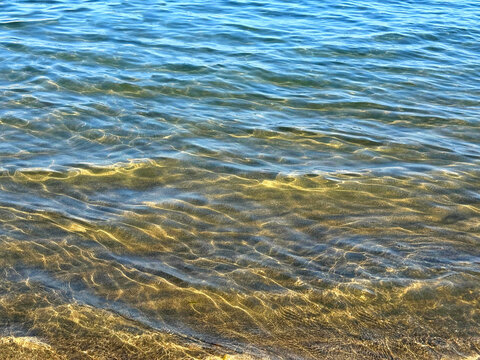 Serene ocean surface with gentle waves.