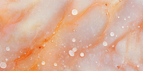 Obraz premium A peach fuzz abstract background with a shimmering, glittery effect, where soft peach tones sparkle delicately like light reflecting off dew drops.