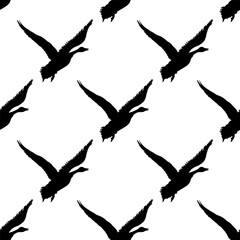 Canada geese. Black silhouettes of vintage style flying birds. Seamless pattern. Hand-drawn graphic design. Vector illustration on white background.