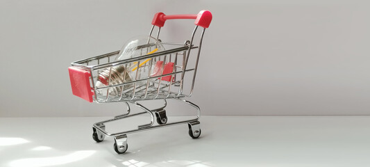 Shopping cart with groceries retail store product display indoor environment side view consumer...