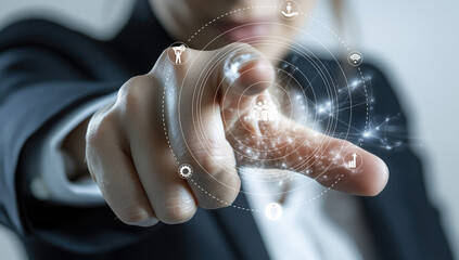 A business professional points towards digital network icons, showcasing advanced technology concepts