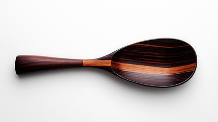 Elegant wooden spoon with dark and light wood grain patterns on a clean white background