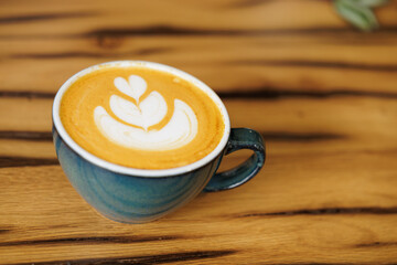 Close-up image of a cup of coffee. A good coffee to start the day with energy and caffeine.