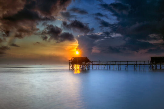 Storm clouds over a wooden pier, Tanjung Kait, Mauk District, Tangerang Regency, Banten, West Java, Indonesia