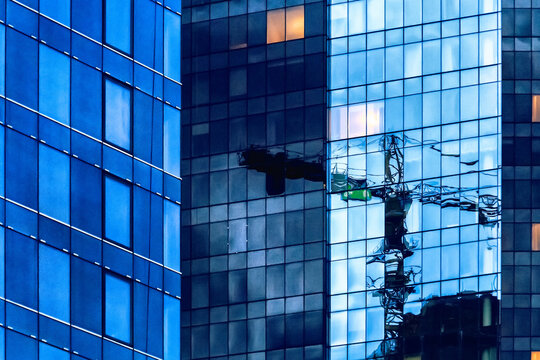 Full frame close-up of a crane reflected in assorted skyscrapers, Tallinn, Estonia