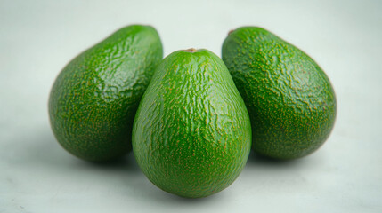 three avocados