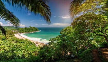 Fototapeta premium Vibrant summer day at a tranquil tropical beach surrounded by lush greenery