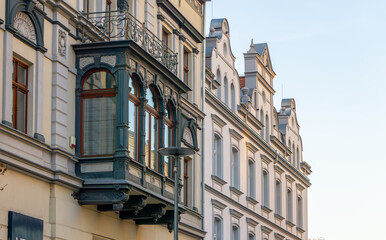 Fototapeta premium urban architecture, old buildings of residential tenement houses. tenement houses with various beautiful decorations. buildings after renovation in the city.