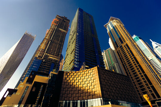 Low angle view of skyscrapers, Dubai, UAE