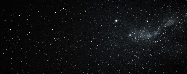 Obraz premium A vast expanse of night sky filled with countless stars and celestial objects, creating a mesmerizing cosmic view.