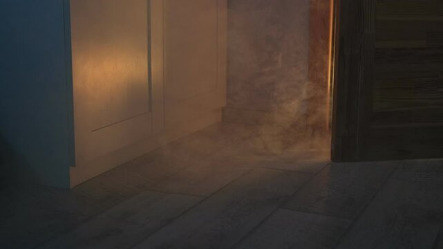 Smoke fire in the apartment. A fire starts in the house at night. Close up smoke comes out from under the door
