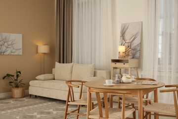 Beautiful furniture and decor in cozy living room. Interior design
