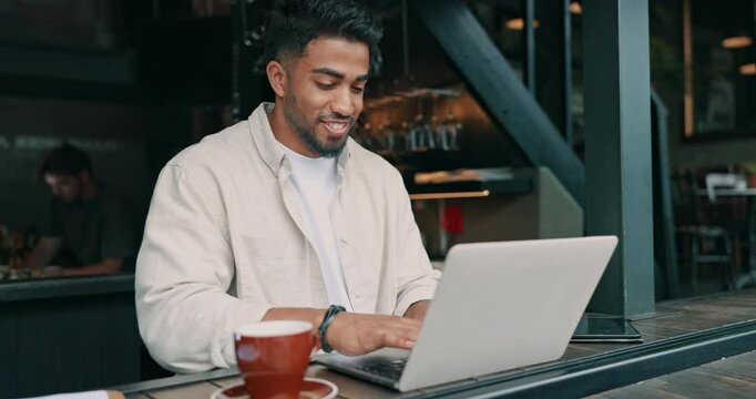 Remote work, laptop and happy man typing in cafe as interactive fiction writer in small business. Computer, coffee shop and digital nomad working on project, reading ebook and publish story online