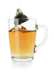 Brewing aromatic tea. Cup with teabag isolated on white