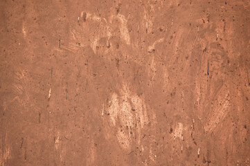 brown background, in the photo a concrete wall painted brown
