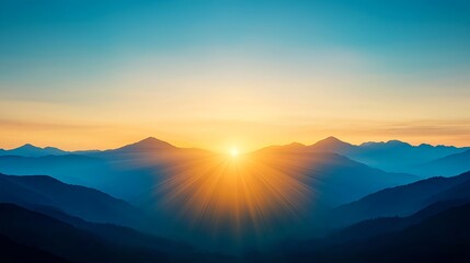 Obraz premium Majestic Mountain Sunset: Golden Rays and Blue Peaks