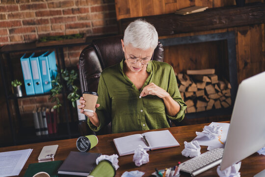 Photo of sad uspet charming lady manager spill coffee workplace workstation messy table interior indoors