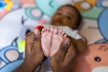 A little girl doing tummy time, a little girl. Newborn premature baby. Tummy time is fun time....