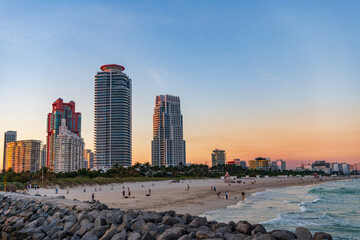 City skyline in evening sunset. Aerial waterfront cityscape. Miami South beach. Aerial panoramic...