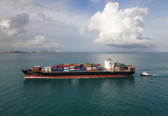 Cargo business. Container ship. Shipping logistics. Commercial shipping. Cargo ship in sea, aerial...