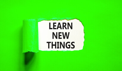 Learn new things symbol. Concept words Learn new things on beautiful white paper. Beautiful green table green background. Business motivational learn new things concept. Copy space.