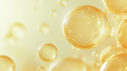 Bubbles of golden liquid floating gently in a soft light background create a calming and enchanting atmosphere
