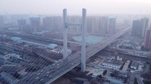Exploring Zhengzhou Agricultural Road Bridge and Railway Bridge amidst urban development