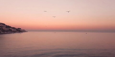Sunset sunrise scene of the sea with pink sky. Sky sea and bird silhouette with mountain horizon background wallpaper