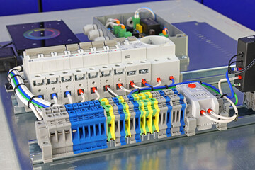 Circuit breakers to protect electrical loads in the electrical switchboard. Soft focus. Close-up. 