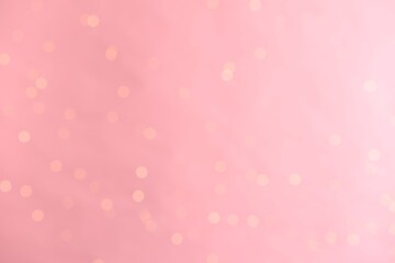 Pink background with blurred lights, bokeh effect
