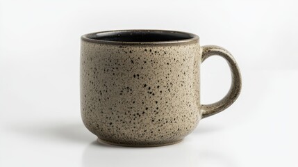 Close-up of a ceramic mug on a white surface, ideal for beverage-related marketing or kitchen accessories.