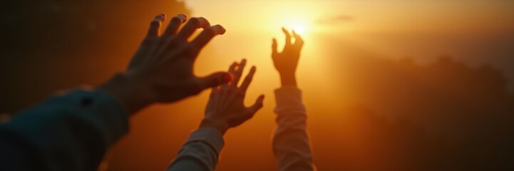 Hands reaching towards a radiant sunset, symbolizing hope, aspiration, and connection with nature.