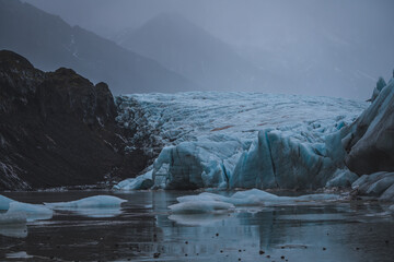 Frozen Glacier Landscape with Ice Formations and Mountains