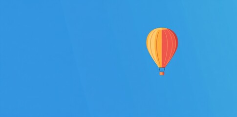 Obraz premium A Single Hot Air Balloon Soaring Through a Clear Blue Sky
